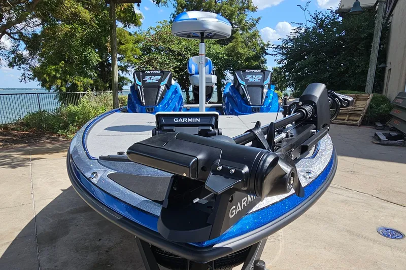Slide: The Image of 2027 Nitro Z18 XL Pro boat with Garmin equipment, parked outdoors. - 3
