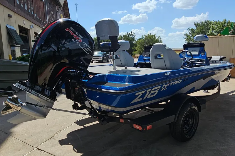 Slide: The Image of 2027 Nitro Z18 XL Pro boat with Mercury Pro XS engine, parked outdoors. - 6