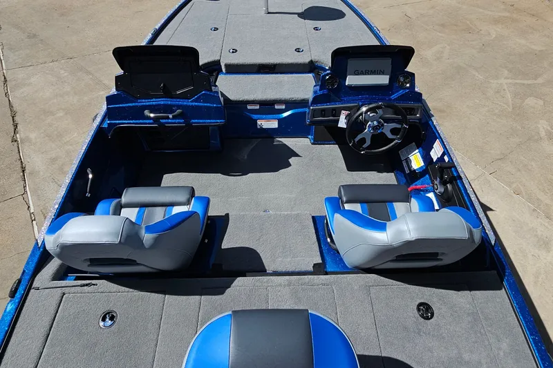 Slide: The Image of 2027 Nitro Z18 XL Pro boat interior with dual seats and Garmin navigation system. - 10