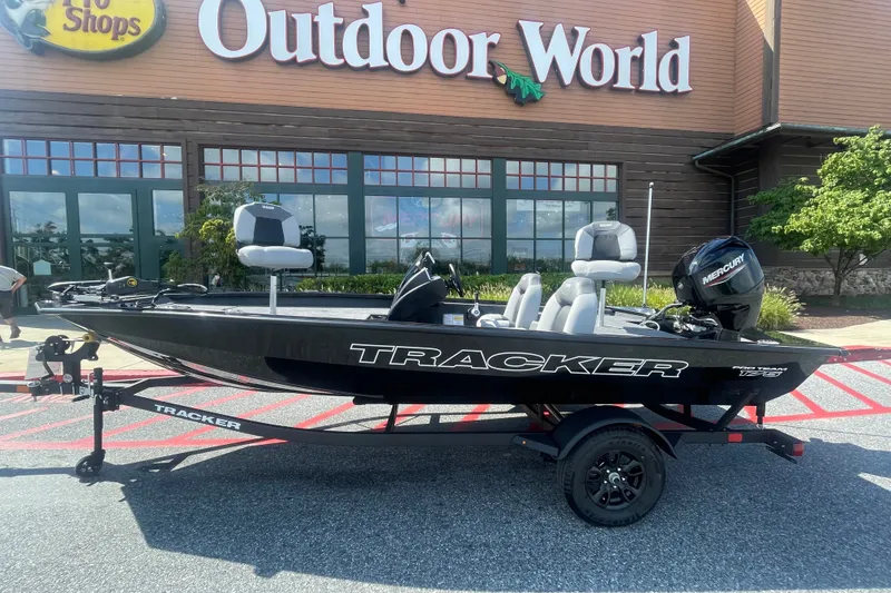 The Image of 2027 Tracker Pro Team 175 boat displayed outside Outdoor World store. - 0