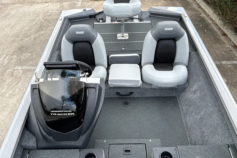 Slide: The Image of 2027 Tracker Pro Team 175 boat interior with dual seats and steering console. - 17