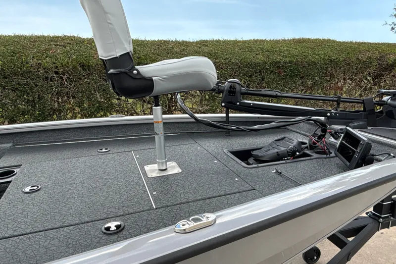 Slide: The Image of 2027 Tracker Pro Team 175 boat deck with seat and control panel. - 22