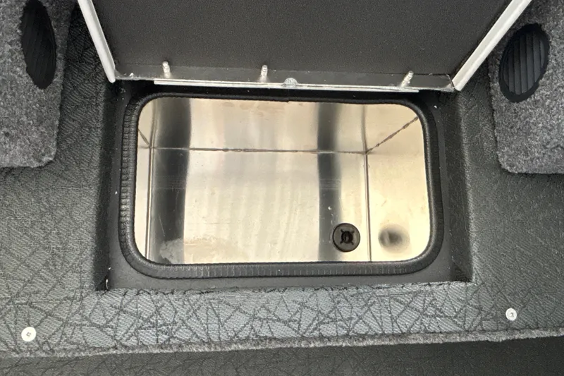 Slide: The Image of Open storage compartment in 2027 Tracker Pro Team 175 boat interior. - 26
