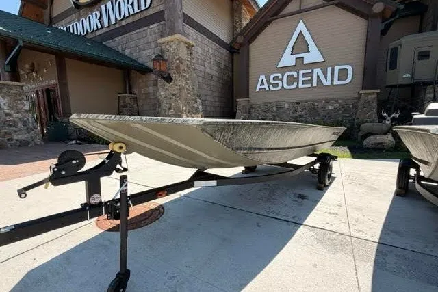 The Image of 2027 Tracker Grizzly 1648 Utility boat on trailer outside Ascend store. - 0