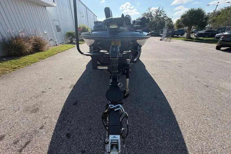 Slide: The Image of 2027 Nitro Z18 XL boat trailer parked on sunny asphalt road. - 9