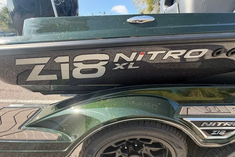 The Image of 2027 Nitro Z18 XL boat, green exterior, close-up view of branding and design details. - 0