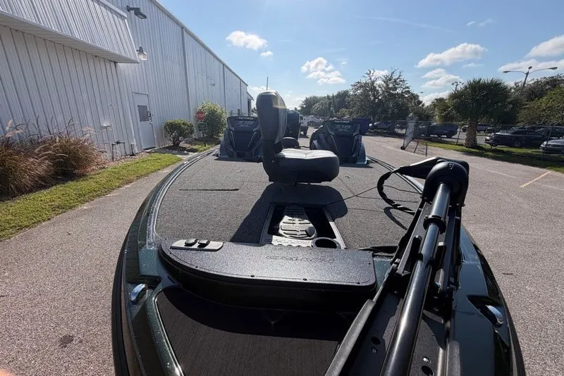Slide: The Image of 2027 Nitro Z18 XL boat parked outdoors, showcasing sleek design and modern features. - 10