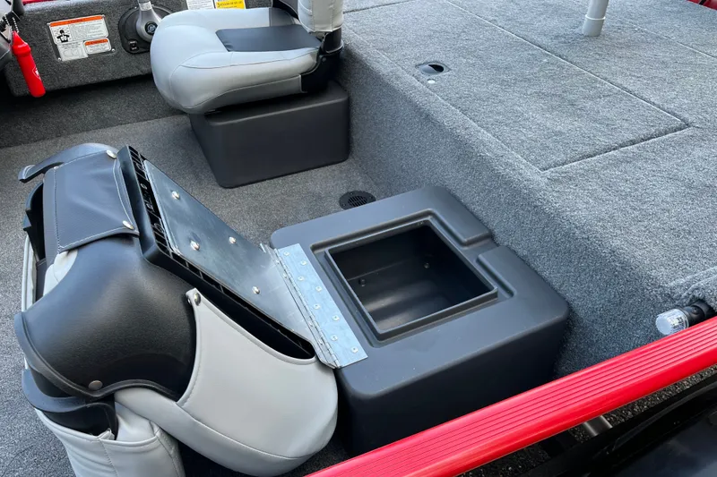 Slide: The Image of Interior of 2027 Tracker Bass Tracker Classic XL boat with storage compartment and seating. - 10