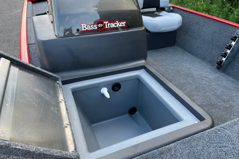 Slide: The Image of 2027 Tracker Bass Tracker Classic XL boat interior with open storage compartment. - 19
