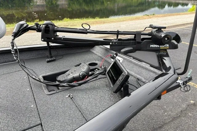 Slide: The Image of 2027 Tracker Pro Team 175 boat with Minn Kota trolling motor and fish finder on deck. - 20