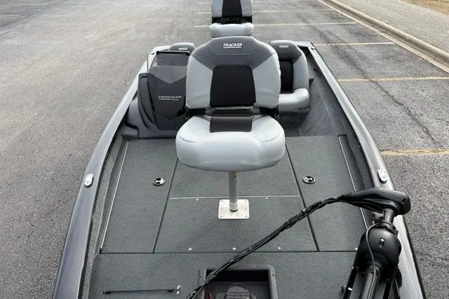 Slide: The Image of 2027 Tracker Pro Team 175 fishing boat with swivel seats and trolling motor. - 13