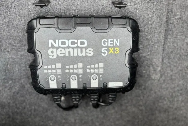 Slide: The Image of NOCO Genius GEN 5X3 battery charger in Tracker Pro Team 175, 2027 model. - 28