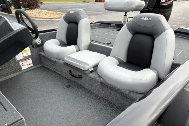 Slide: The Image of 2027 Tracker Pro Team 175 boat interior with dual gray and black seats. - 15