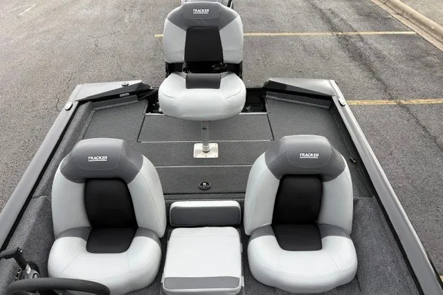 Slide: The Image of 2027 Tracker Pro Team 175 boat interior with three cushioned seats. - 27