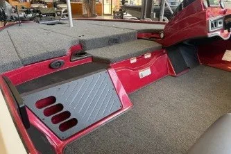 Slide: The Image of 2027 Nitro Z18 XL Pro boat interior with red accents and carpeted flooring. - 5