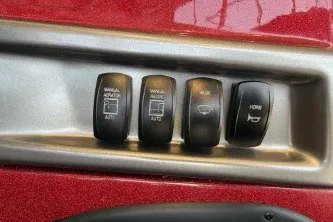 Slide: The Image of Control panel of 2027 Nitro Z18 XL Pro with manual adjust, horn, and windshield buttons. - 7