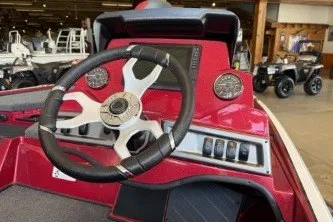 Slide: The Image of 2027 Nitro Z18 XL Pro boat dashboard with steering wheel and control panel. - 4