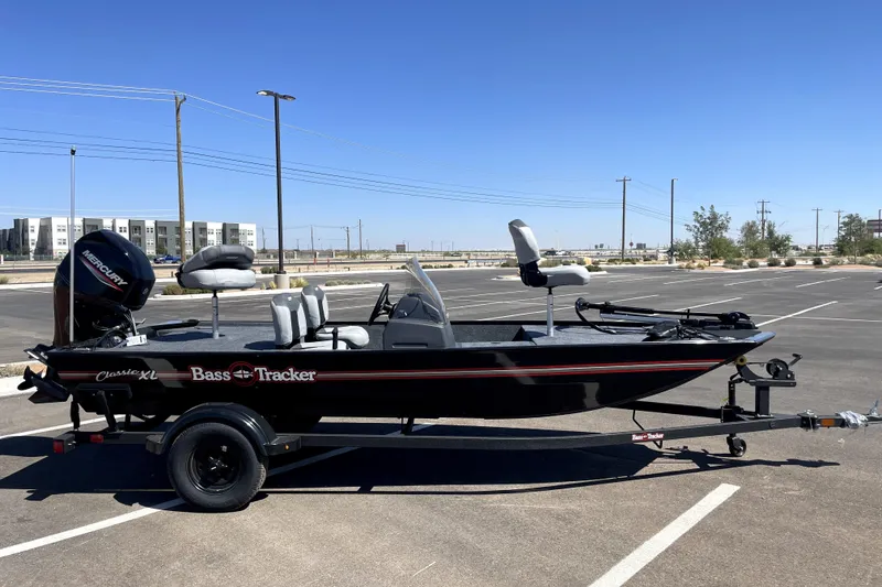 The Image of 2027 Tracker Bass Tracker Classic XL boat in parking lot, side view. - 0