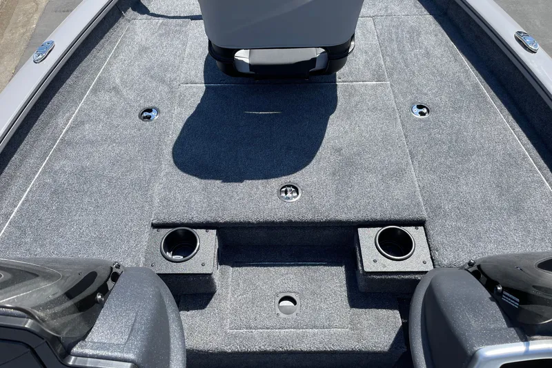 Slide: The Image of 2027 Tracker Pro Team 175 boat interior with carpeted deck and seating area. - 20