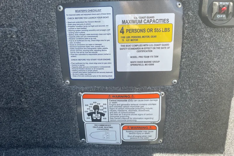 Slide: The Image of Boater's safety checklist and capacity warnings on 2027 Tracker Pro Team 175 boat. - 29