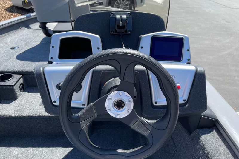 Slide: The Image of Steering console of 2027 Tracker Pro Team 175 boat with dual displays. - 17