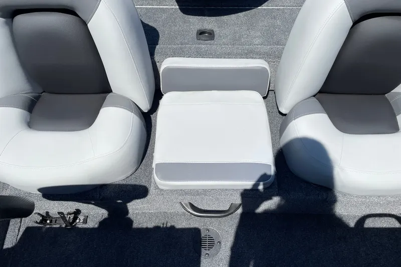 Slide: The Image of 2027 Tracker Pro Team 175 boat interior with gray and white seating. - 15