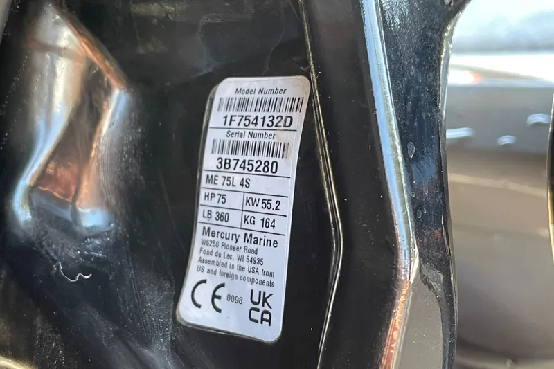 Slide: The Image of Label on Mercury Marine engine, showing model and serial numbers, with specifications and certifications. - 66