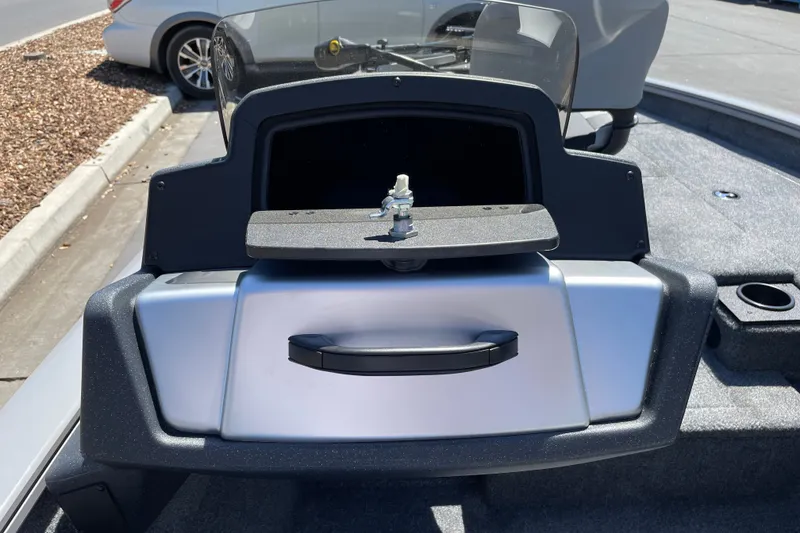 Slide: The Image of 2027 Tracker Pro Team 175 boat dashboard with steering wheel and controls. - 19