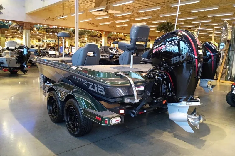 Slide: The Image of 2027 Nitro Z18 XL Pro boat with Mercury Pro XS 150 engine in showroom. - 2