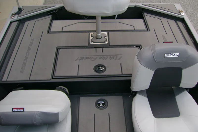 Slide: The Image of 2027 Tracker Pro 170 boat interior with seating and storage compartments. - 17