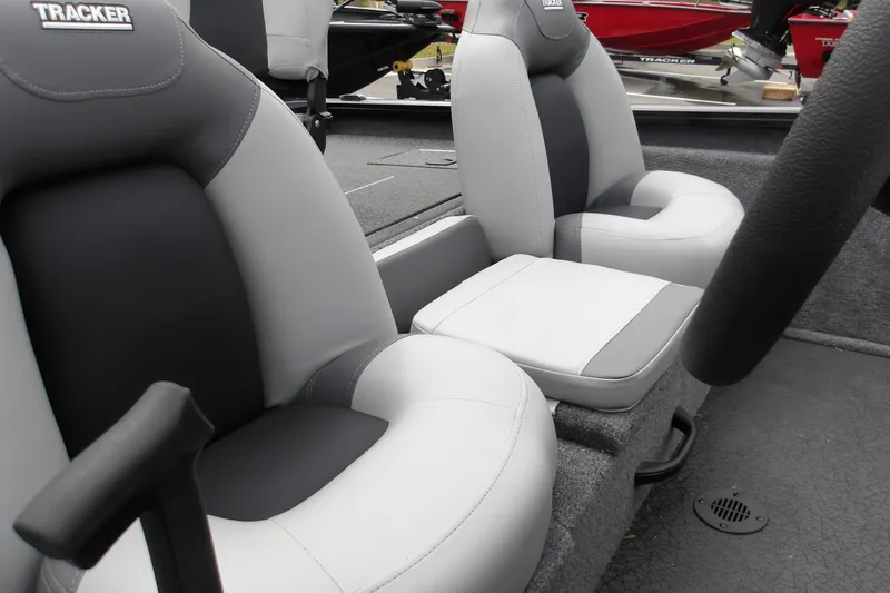 Slide: The Image of 2027 Tracker Pro Team 175 boat interior with gray and black seating. - 19