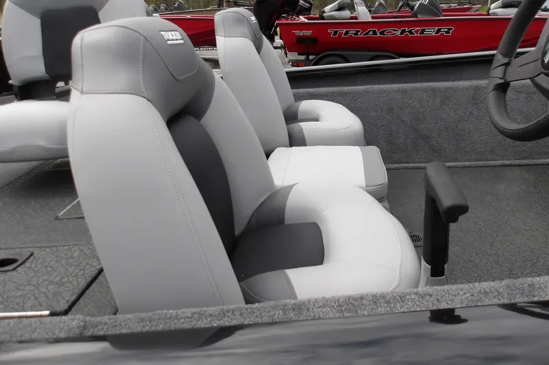 Slide: The Image of 2027 Tracker Pro Team 175 boat interior with gray and black seating. - 18