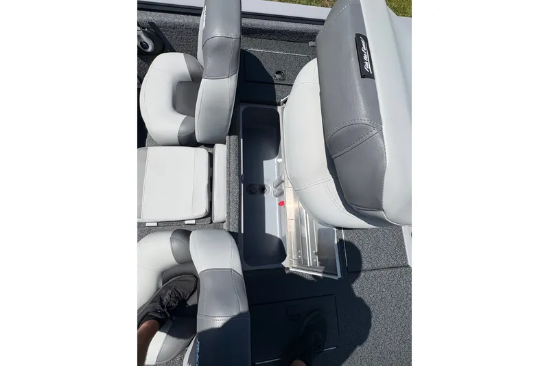 Slide: The Image of 2027 Tracker Pro Team 175 boat interior with gray and white seating arrangement. - 14