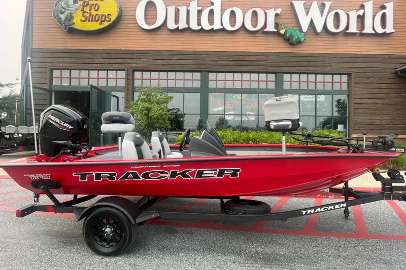 The Image of 2027 Tracker Pro Team 175 boat displayed outside Outdoor World store. - 0