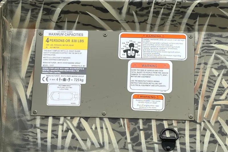 Slide: The Image of Warning labels on Tracker Grizzly 1553 Timber 2027 boat, highlighting safety and capacity information. - 30