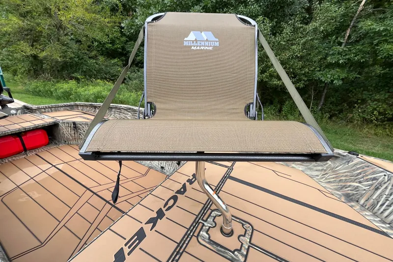Slide: The Image of Millennium Marine seat on 2027 Tracker Grizzly 1553 Timber boat deck. - 13