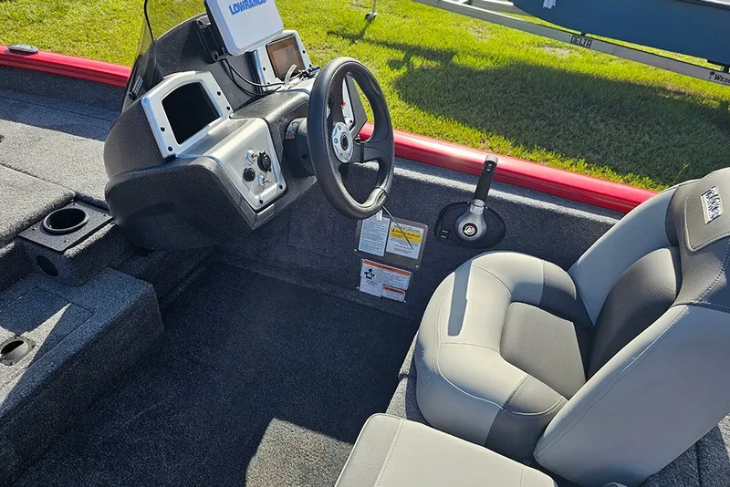 Slide: The Image of 2027 Tracker Pro Team 175 boat interior with steering wheel and control panel. - 15