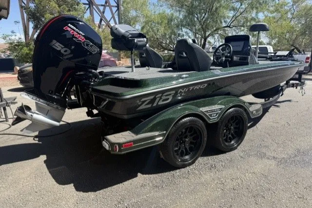 Slide: The Image of 2027 Nitro Z18 XL Pro boat with powerful engine, parked outdoors on a sunny day. - 1