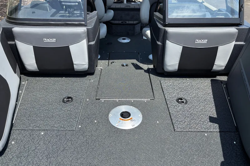 Slide: The Image of 2027 Tracker Pro Guide V-175 Combo boat interior with seating and storage compartments. - 13