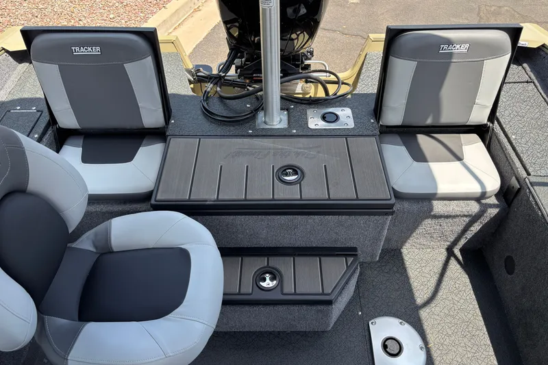Slide: The Image of 2027 Tracker Pro Guide V-175 Combo boat interior with seating and storage compartments. - 16