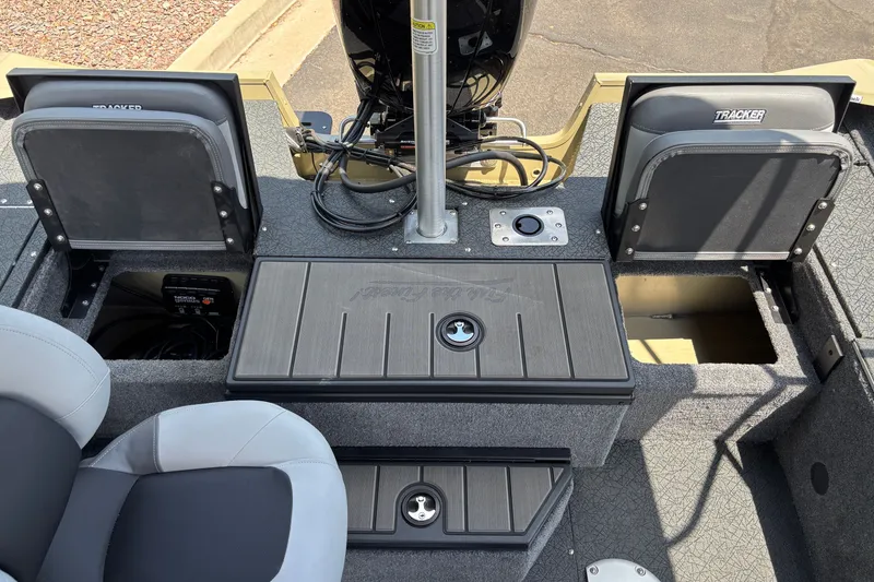 Slide: The Image of Interior view of 2027 Tracker Pro Guide V-175 Combo boat, showcasing seating and storage compartments. - 17
