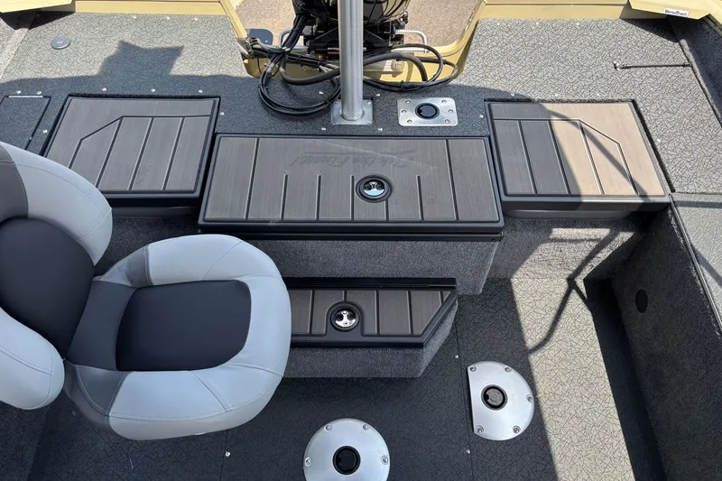 Slide: The Image of Interior of 2027 Tracker Pro Guide V-175 Combo boat with seating and storage compartments. - 15