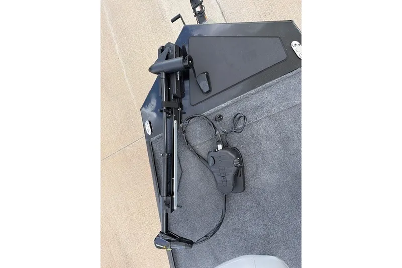 Slide: The Image of 2027 Tracker Bass Tracker Classic XL boat deck with trolling motor and foot pedal. - 38