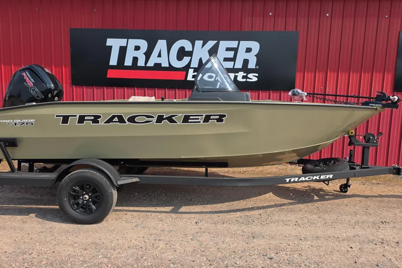 The Image of 2027 Tracker Pro Guide V-175 Combo boat on trailer, displayed outdoors. - 0