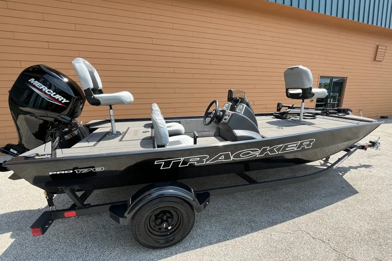 The Image of 2027 Tracker Pro 170 fishing boat with Mercury engine, parked outdoors. - 0