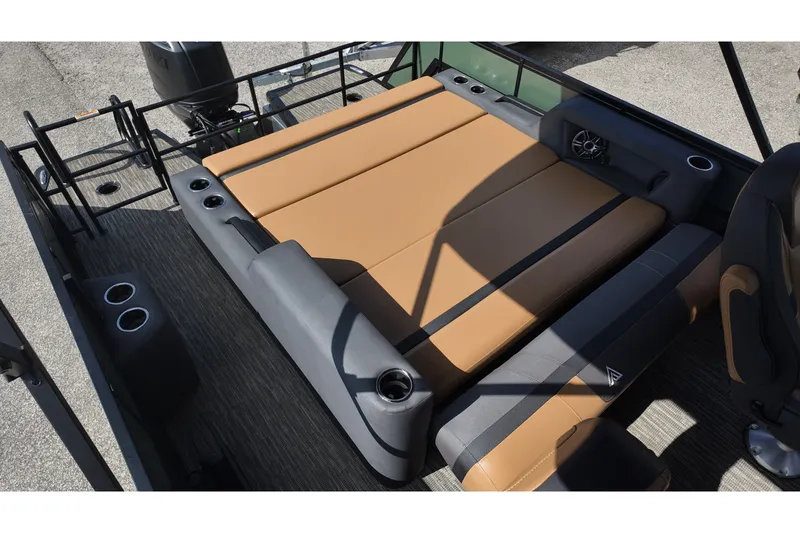 Slide: The Image of Luxurious seating area on 2027 Viaggio X22S boat with cup holders and speakers. - 18