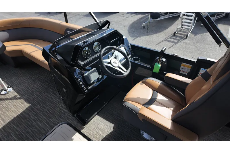 Slide: The Image of 2027 Viaggio X22S boat interior with modern steering console and luxurious seating. - 13