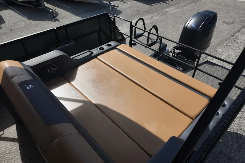 Slide: The Image of 2027 Viaggio X22S boat with tan seating and Suzuki outboard motor. - 9