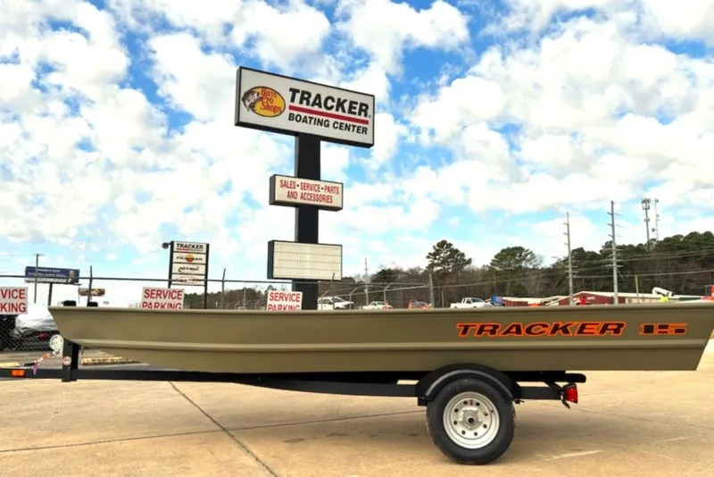 The Image of 2027 Tracker Grizzly 15 Jon boat at Tracker Boating Center under cloudy sky. - 0