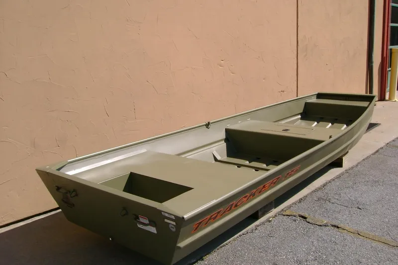 The Image of 2027 Tracker Grizzly 15 Jon boat in olive green, parked outdoors. - 0